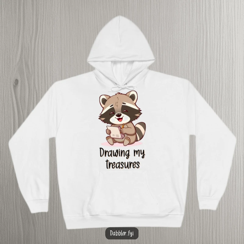 Funny Raccoon Hoodie: A gleeful raccoon character enthusiastically sketches in a notebook, offering cozy comfort and artistic humor.