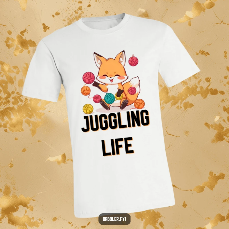 Funny t-shirt featuring a playful fox character juggling colorful yarn balls with a grin, great for crafters.