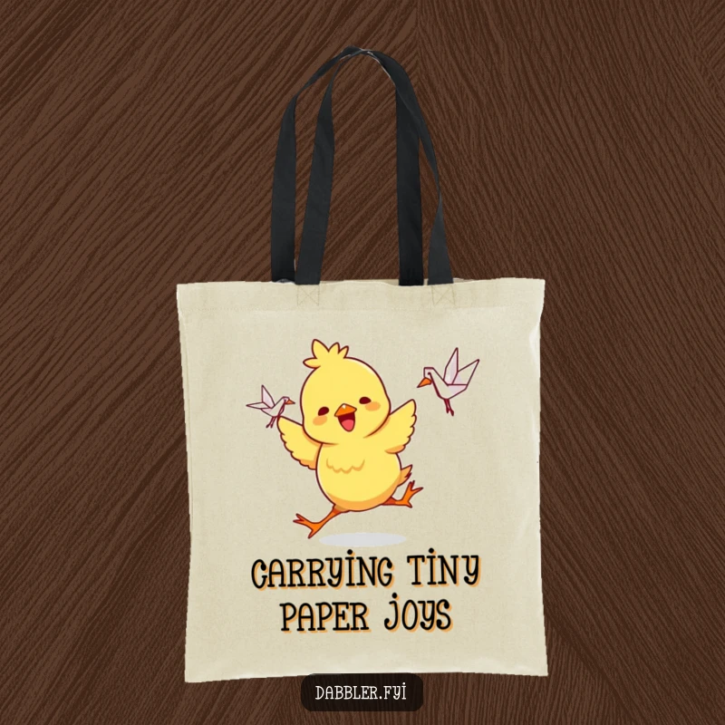 Funny Tote Bag: A playful chick character dances with joy holding a small, intricate origami crane, a cheerful and functional bag.